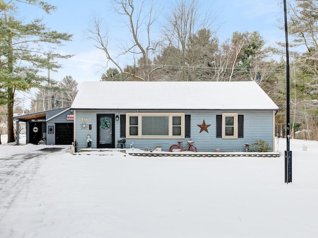 ranch-style home featuring a garage