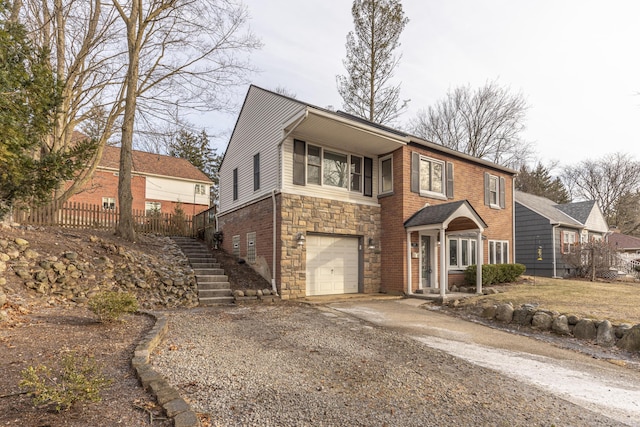 view of front of home with a garage