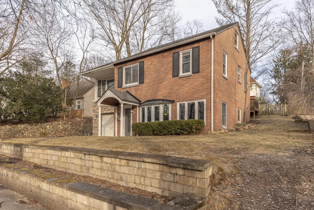 view of front of property featuring a garage