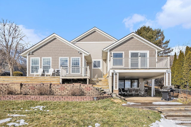 view of front of home with a patio and a front yard