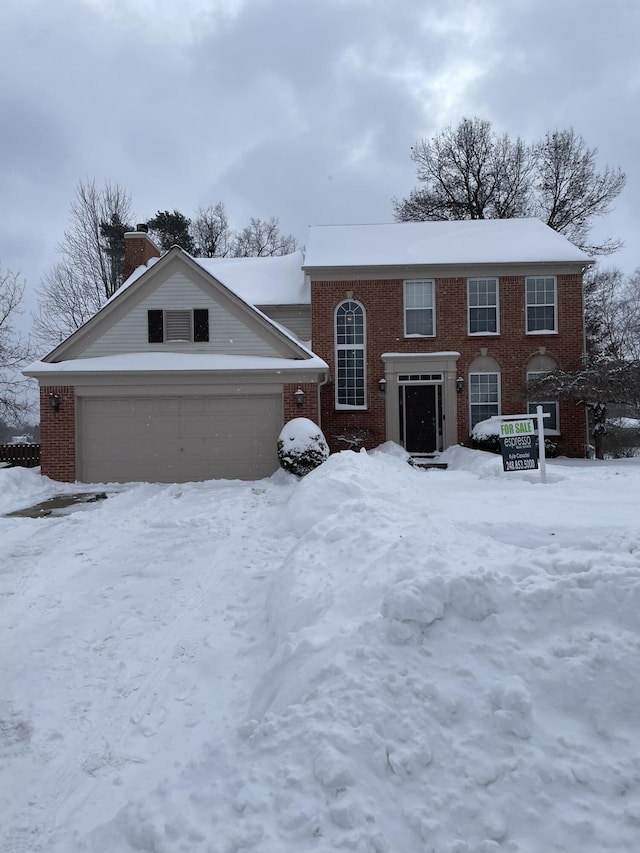 view of front of property with a garage