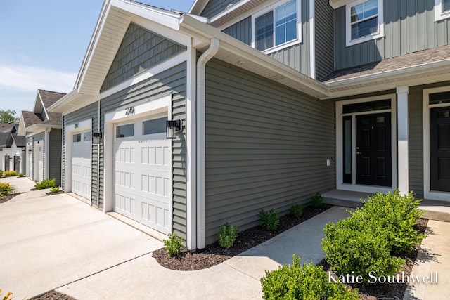 view of property exterior with a garage