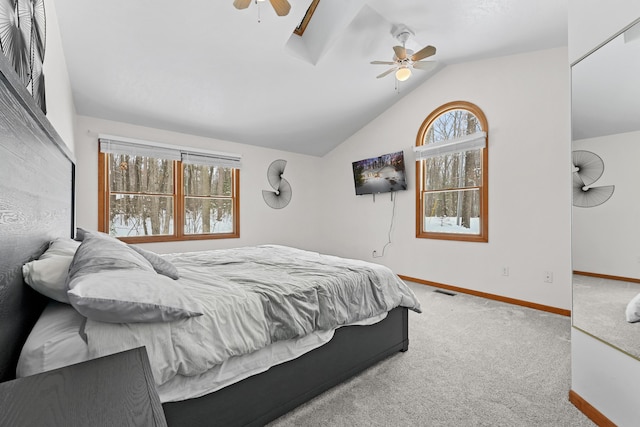 bedroom featuring carpet, lofted ceiling, and ceiling fan