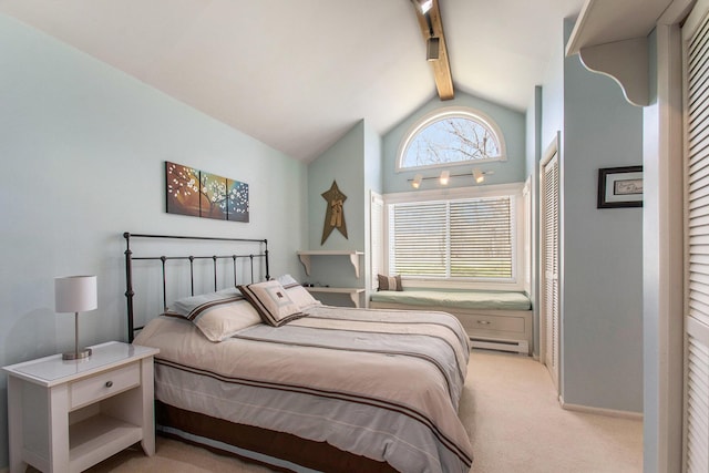 bedroom with light carpet, baseboard heating, baseboards, and vaulted ceiling with beams