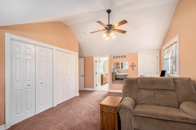 living room with visible vents, a ceiling fan, light carpet, vaulted ceiling, and baseboards
