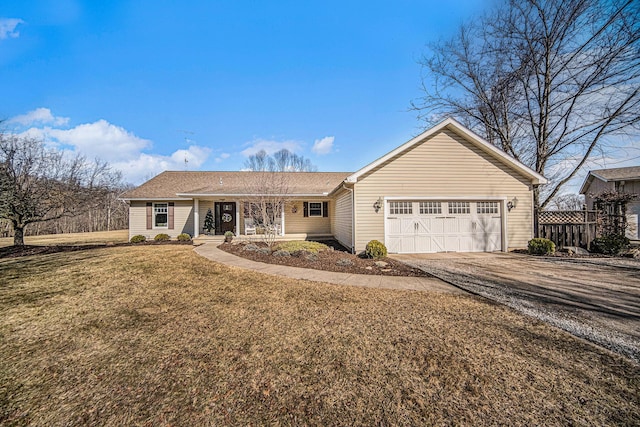 ranch-style house with aphalt driveway, a garage, covered porch, and a front lawn