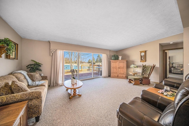 carpeted living room featuring lofted ceiling and a textured ceiling