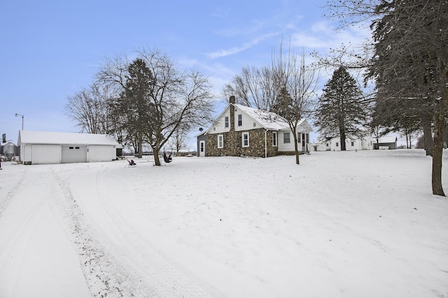 view of yard covered in snow