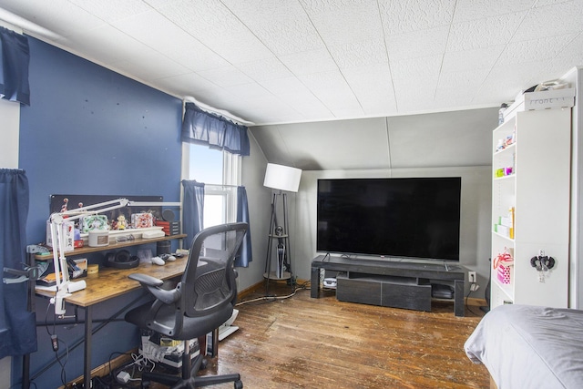 home office featuring lofted ceiling and dark wood-type flooring