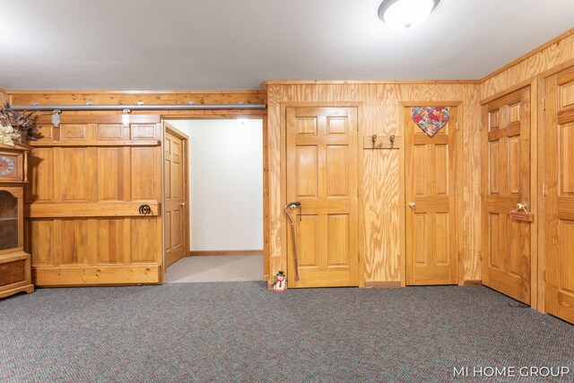 unfurnished bedroom with crown molding and light colored carpet