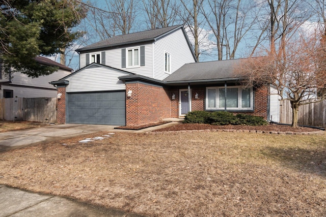 view of front property with a garage and a front yard