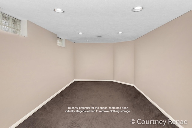 empty room featuring recessed lighting, carpet, and baseboards