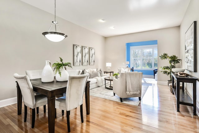 dining space featuring light hardwood / wood-style floors