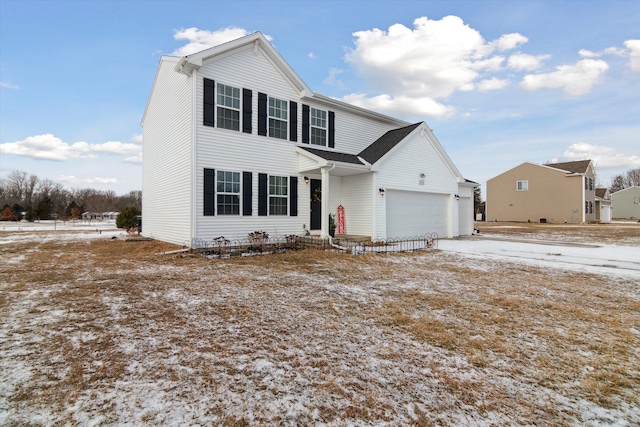 front facade with a garage