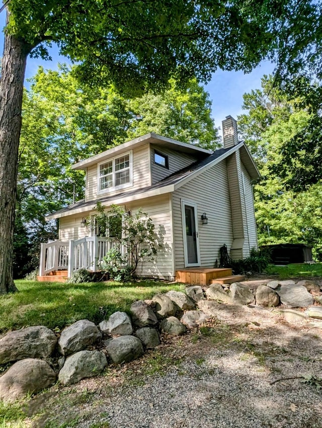 view of front of home with a deck