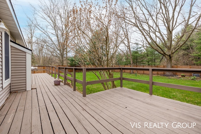13553 Oakfield Ln, Grand Haven, MI 49417 - deck with a lawn and a fenced backyard