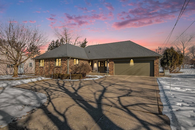 view of front of property featuring a garage