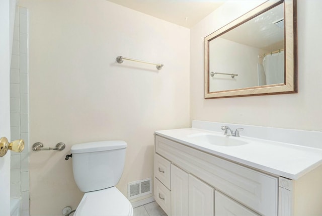 bathroom featuring tile patterned flooring, vanity, a shower with curtain, and toilet