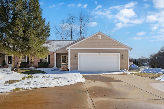 single story home featuring a garage