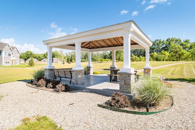 view of community with a gazebo and a yard