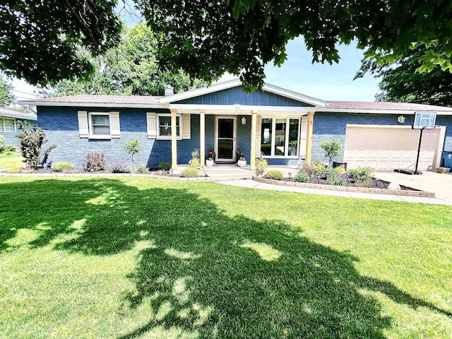 single story home with a garage, concrete driveway, brick siding, and a front lawn