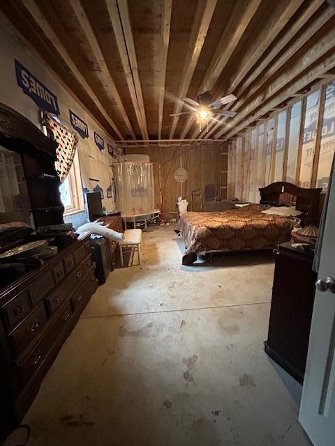 bedroom with concrete floors