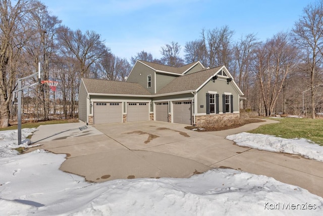 view of side of home with a garage