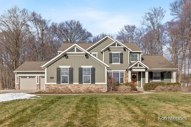 craftsman-style house with a garage and a front yard