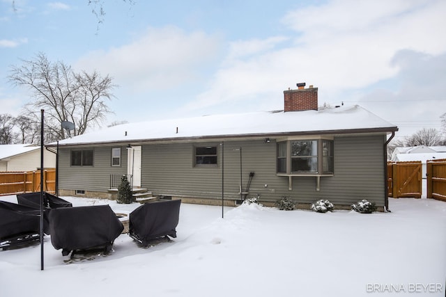 view of snow covered property