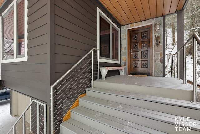 doorway to property featuring a porch