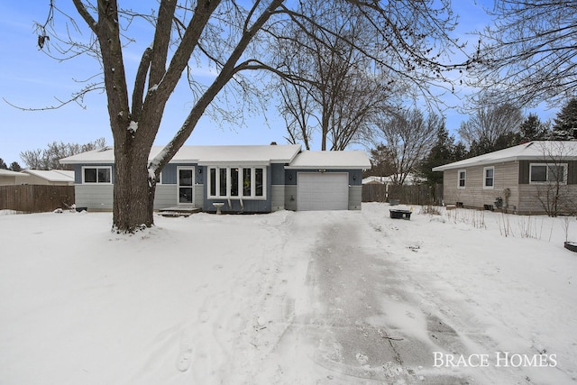 view of front of home with a garage