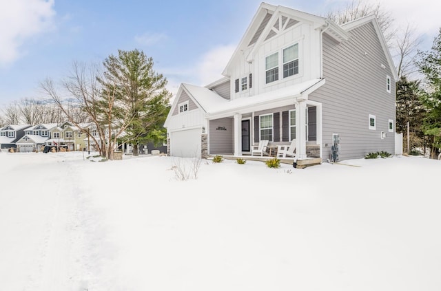 view of front of home with a garage and covered porch