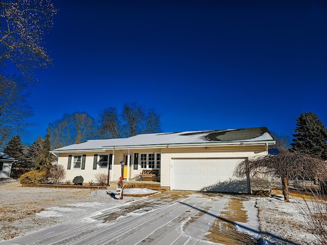 single story home with a garage