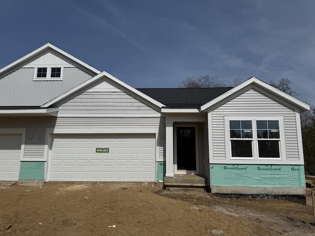 275 Hickory Valley Dr, Kalamazoo, MI 49009 - view of front of house featuring a garage and driveway