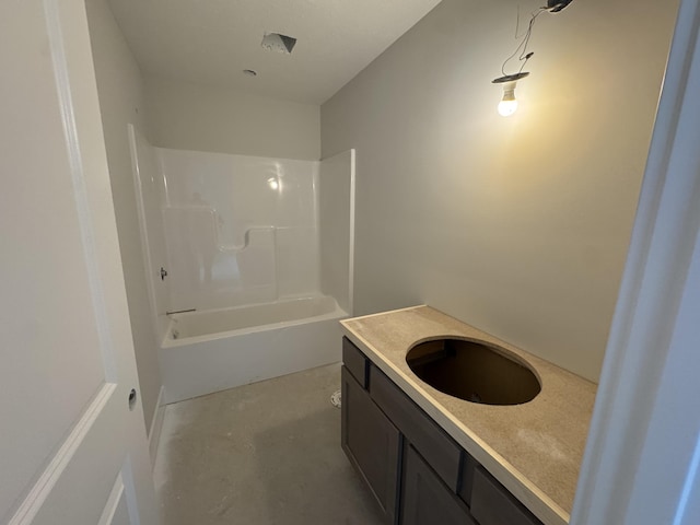 275 Hickory Valley Dr, Kalamazoo, MI 49009 - bathroom featuring vanity, concrete flooring, and bathing tub / shower combination