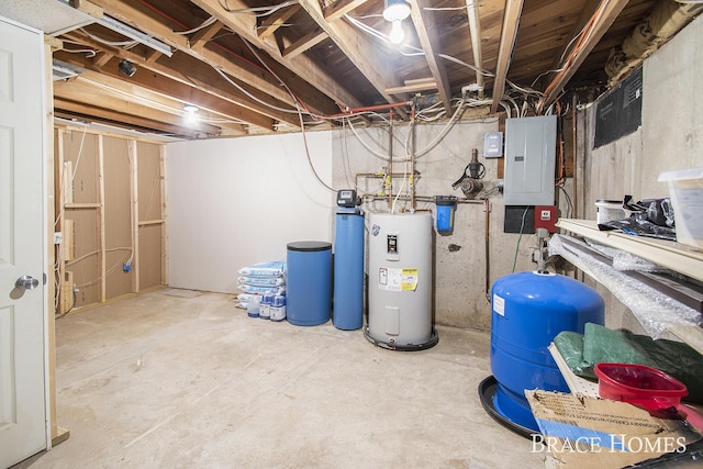 unfinished basement with water heater and electric panel