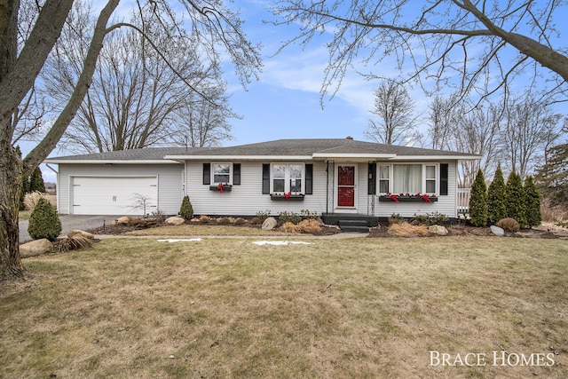 single story home featuring driveway, a front lawn, and an attached garage