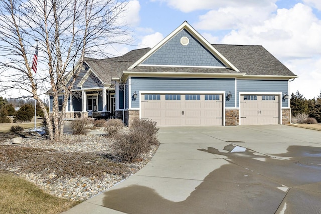 craftsman-style house featuring a garage