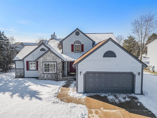 view of front of property with a garage