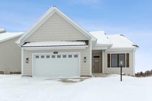 view of front of property featuring an attached garage