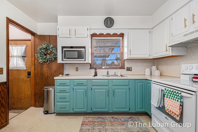 kitchen featuring white cabinetry, sink, and white range with electric stovetop