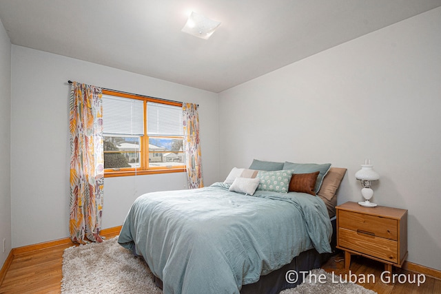 bedroom featuring hardwood / wood-style floors