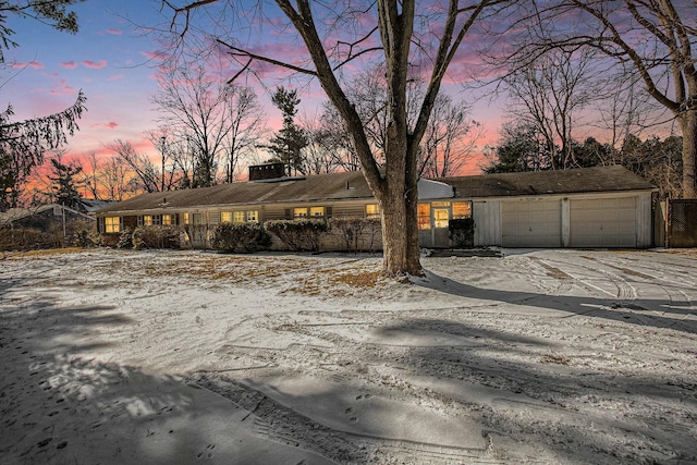 view of front of home with a garage