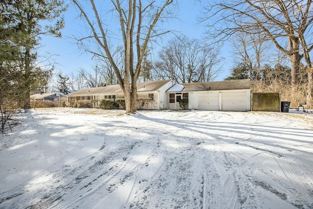 single story home with a garage