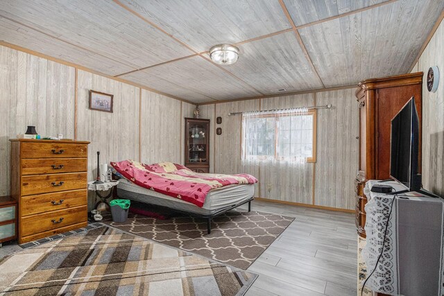 37076 76th St, Covert, MI 49043 - bedroom featuring wooden walls, wood ceiling, and wood finished floors