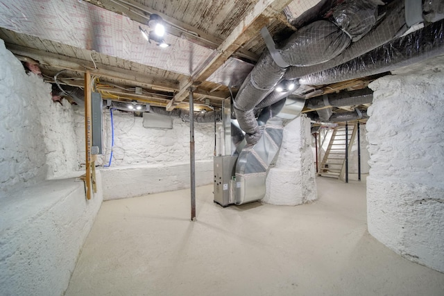 basement featuring heating unit