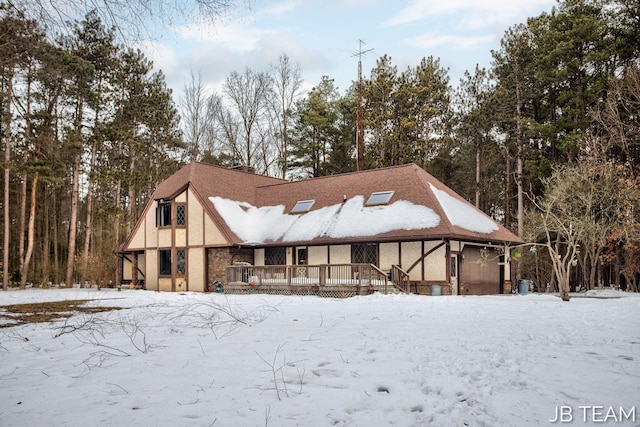 view of front of house with an attached garage and stucco siding