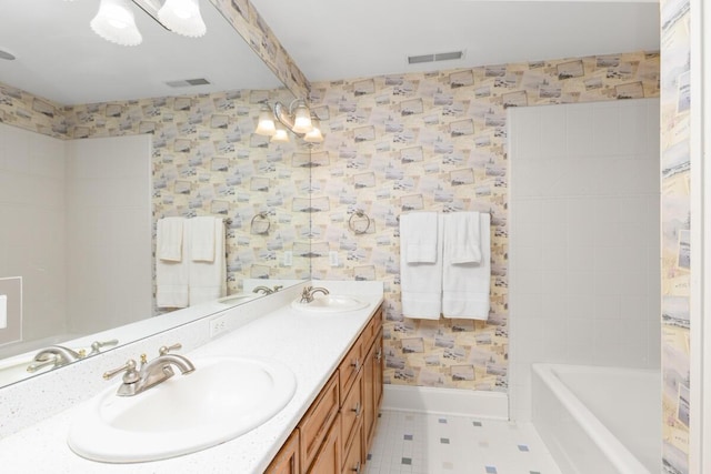 bathroom featuring vanity and beam ceiling