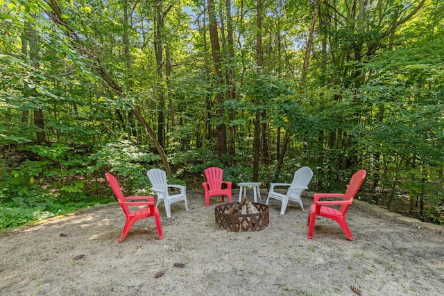 view of patio with an outdoor fire pit