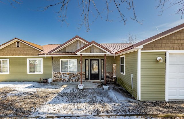 view of front of home with a garage